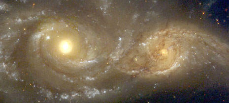 Galassie a spirale NGC 2207 e IC 2163 in collisione