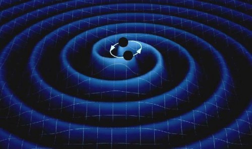 Rappresentazione artistica di un sistema di due stelle di neutroni in rotazione che perdono energia a causa dell’emissione di onde gravitazionali.